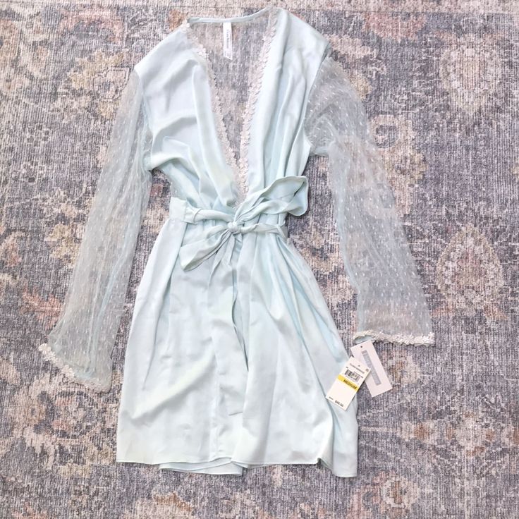 Flora Nikrooz Showstopper Robe In Sea Glass (Nwt) Size Medium *Nwt; Never Worn *Smoke Free/Pet Free Home **From Brand Description: Here Comes The Perfect Bridal Robe With Delicate Beautiful Floral Appliqus. Body: 100% Polyester Netting: 100% Nylon. Hand Wash. Imported. Style # 8061 Summer V-neck Night Robe, Summer Night V-neck Robe, Spring V-neck Sleepwear For Wedding Night, Light Blue V-neck Sleepwear For Summer, Light Blue V-neck Sleepwear For Spring, Chic Summer Sleepwear For Wedding Night, Chic Sleepwear For Wedding Night In Summer, Chic Summer Wedding Night Sleepwear, Spring V-neck Night Robe