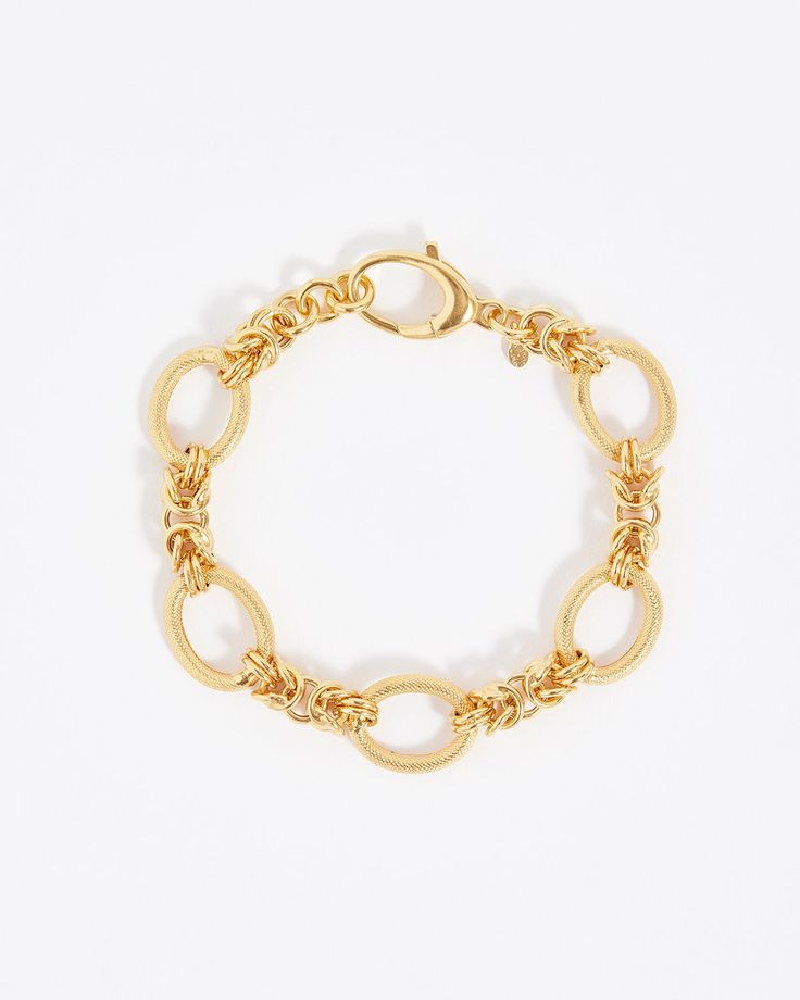 Knotted gold chain sits between textured oval links creating a versatile bracelet with modern elegance.Materials18ct gold plated silverBracelet length (approx)17.5cm 2cm extender Gold Link Bracelet With Hook And Links, Formal Gold Chain Bracelet With Hook And Links, Gold-tone Chunky Chain Bracelet With Oval Links, Elegant Gold Chain Bracelet With Hooks And Links, Gold-tone Gold Bracelet With Chunky Oval Link Chain, Elegant Charm Bracelet With Chunky Oval Links, Gold Metal Bracelets With Cable Chain, Gold Cable Chain Metal Bracelets, Gold Chain Bracelet With Hook And Links For Everyday