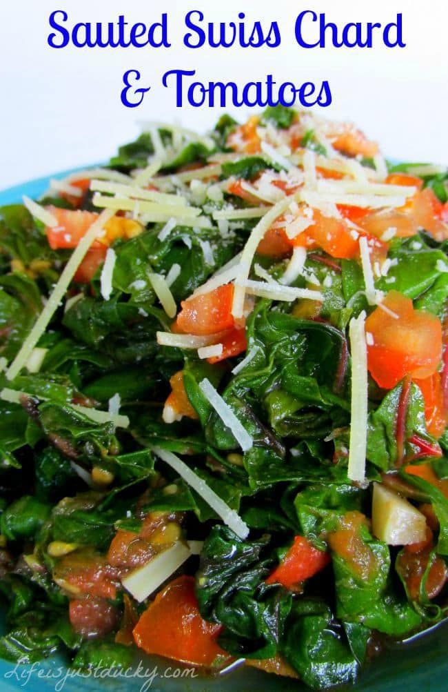 a blue plate topped with salad and cheese