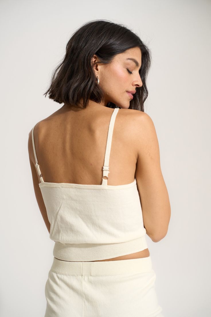 Made of 100% cotton, this wear-everyday tank is just the right blend of elevated and easy making it perfect for bedtime and beyond. Casual Loungewear Tops With Built-in Bra, Spring Tops With Built-in Bra For Relaxation, Solid Tops With Built-in Bra For Daywear, Cotton Tops With Built-in Bra For Daywear, Comfortable Fitted Tops For Loungewear, Comfortable Fitted Loungewear Tops, Casual Camisole With Built-in Bra For Relaxation, Basic Cotton Tops With Built-in Bra, Stretch Cotton Camisole With Built-in Bra