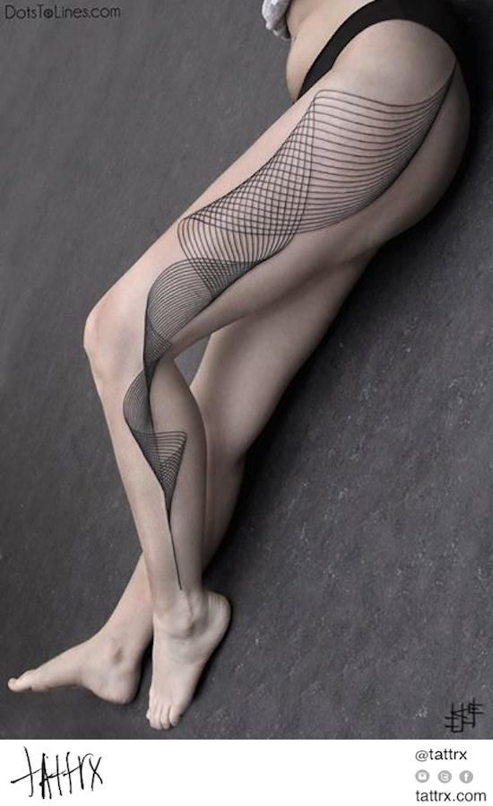 a woman is laying on the floor with her legs crossed and wearing fishnet stockings