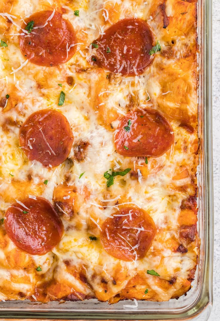 a pizza casserole with cheese and pepperoni