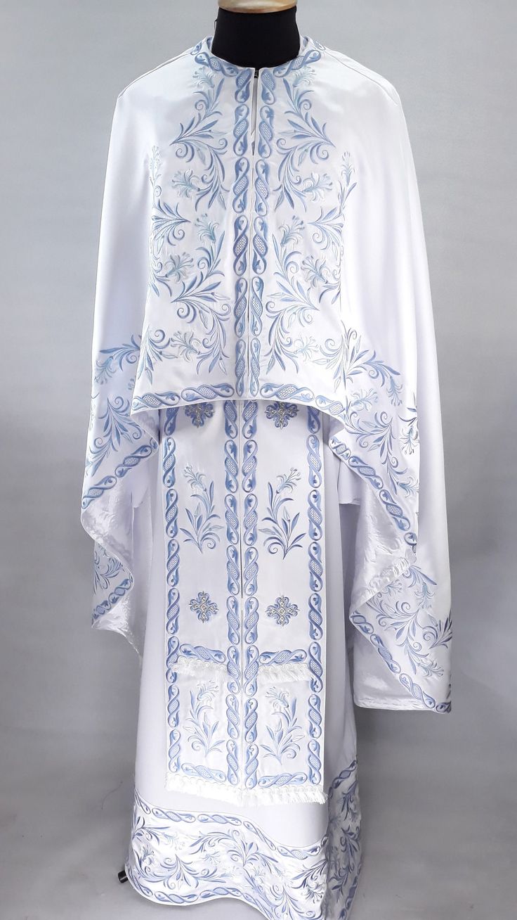 White Greek Liturgical vestment, Embroidered Priest vestment set, Greek vestment, Priest robes, Religious Clothing, Priest's robes are embroidered PLEASE be sure to indicate your height in the order notes when purchasing Model: Ф2195 The set includes: - top shirt - epatrachyl (Stole) - oversleeves (on laces, if desired, make rubber bands) - belt - air cover - bedspreads (2 pieces) - podriznik, which is made of gabardine, only the lower insert of silk. Trimmer without a rack, with a button clasp Priest Robes, Cult Of Personality, Church Attire, Textiles Projects, Greek Clothing, Brocade Fabric, Clothes Line, White Silk, Rubber Bands