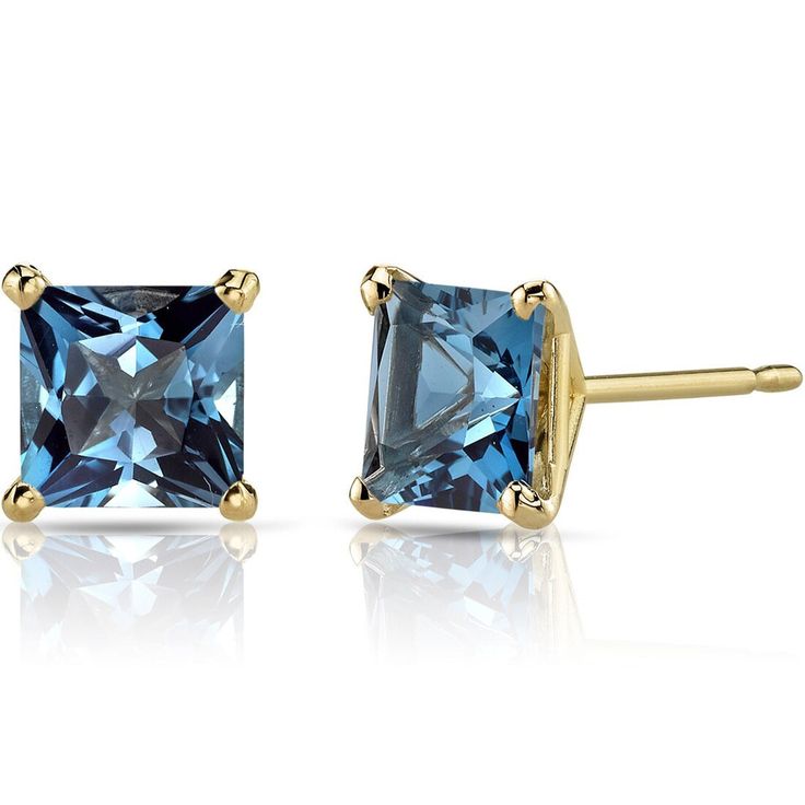 Our midnight muse You'll immediately fall in love with this mystical, midnight London Blue Topaz. These classic earrings feature princess shape Peora natural london blue topaz gemstones in 14K yellow gold. Our natural London Blue Topaz gemstones are a unique gift from nature. By cutting them in a way that respects the rough's natural radiance, we ignite their inherent intensity and maximize their brilliance to deliver on our signature Peora standard. Handcrafted in pure 14K yellow gold goodness, these earrings have been carefully coated in an elegant rhodium finish. Our artisans are expertly trained in this process which fortifies the earring's strength, shine and brilliance. Looking for a special jewelry gift for someone special? Our concierge stylists are here to help with all of your je Princess Cut Stud Earrings, Princess Cut Gold, Blue Topaz Earrings, Classic Earrings, Topaz Earrings, Swiss Blue Topaz, London Blue Topaz, London Blue, Topaz Gemstone