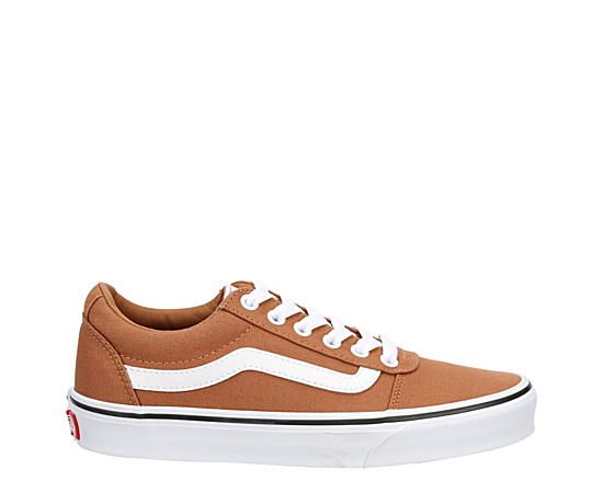 Vans Ward Lo Women's Sneaker Street style never looked as good as the Ward Lo women's Sneaker from Vans. The lightweight canvas upper featuring clean color or prints keeps your cool skater vibe intact. A Cushioned insole comforts your steps while the signature waffle outsole adds traction. Canvas upper Lace-up closure Stitching detailsVulcanized midsoleWaffle Rubber outsole Casual Brown Sneakers For Summer, Casual Brown Summer Sneakers, Vans Casual Lace-up Canvas Shoes, Casual Vans Canvas Shoes, Casual Brown Vans Skate Shoes, Vans Casual Canvas Shoes With Round Toe, Casual Vans Canvas Shoes With Round Toe, Vans Brown Sneakers For Spring, Vans Casual Sneakers For Spring