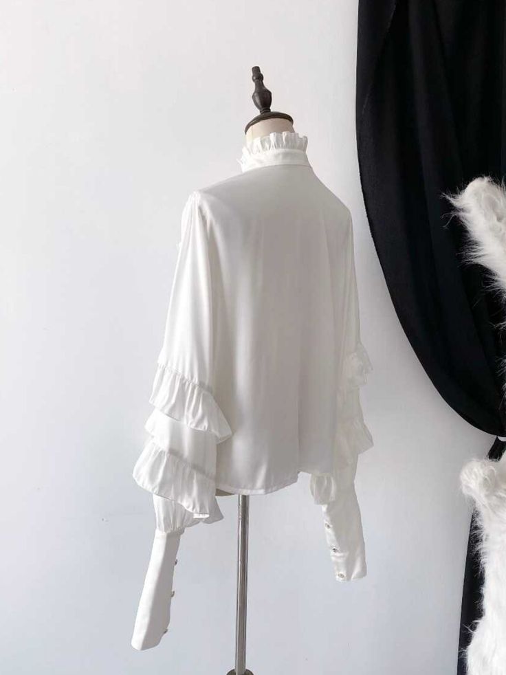 This price includes a shirt only, others are not included. SizeSMLBust115122.5130Shoulders394041Full Length566064Sleeve Length798081 White Blouse With Collar For Fall, White Collar Blouse For Fall, Fall White Blouse With Collar, Fitted White Blouse With Long Sleeves, White Fitted Blouse With Long Sleeve, Fall Tops With Ruffled Collar, Fall Solid Tops With Ruffled Collar, Long Sleeve Ruffled Shirt, Long Sleeve Ruffled Summer Shirt