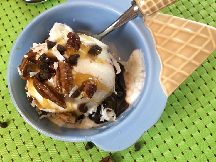 an ice cream sundae in a blue bowl