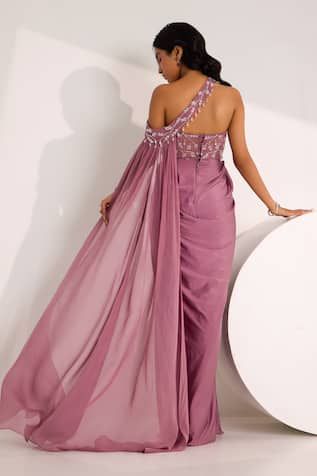 Mauve padded saree gown embellished by crystal and bead floral vine motifs on bodice and pleated waist. Comes with bead-crystal embellished detachable drape. - Aza Fashions Glamorous Georgette Saree Dress, Festive Evening Dress With Sweep Train, Organza Gown With Sweep Train, Evening Gown With Mirror Work And Traditional Drape, Evening Gown With Traditional Drape And Mirror Work, Traditional Drape Gown With Mirror Work For Evening, Glamorous Draped Dress With Zari Work, Glamorous Silk Saree Dress, Embellished Saree Dress For Gala