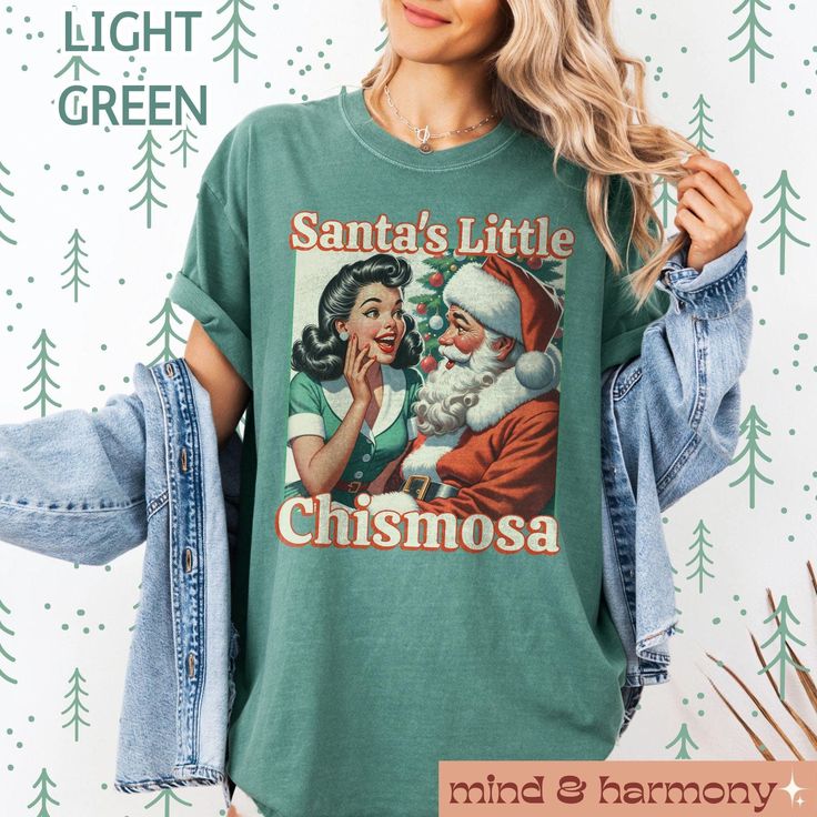 This Chismosa Christmas Gift Comfort Colors T-shirt is a funny and festive holiday shirt perfect for Latina moms and anyone who loves a good chisme. Featuring a colorful design, this shirt is great for Navidad parties, Hispanic Xmas celebrations, and Mexican fiestas. The soft garment-dyed fabric and relaxed fit make it comfortable for casual wear or semi-formal settings. Product features - Available in sizes S to 4XL for a perfect fit - Double-needle stitching for durability - Made with soft, dy Green Santa, Funny Holiday, Comfort Colors Shirt, Holiday Shirt, Holiday Humor, Mom Tees, Trending Today, Retro 90s, Holiday Shirts