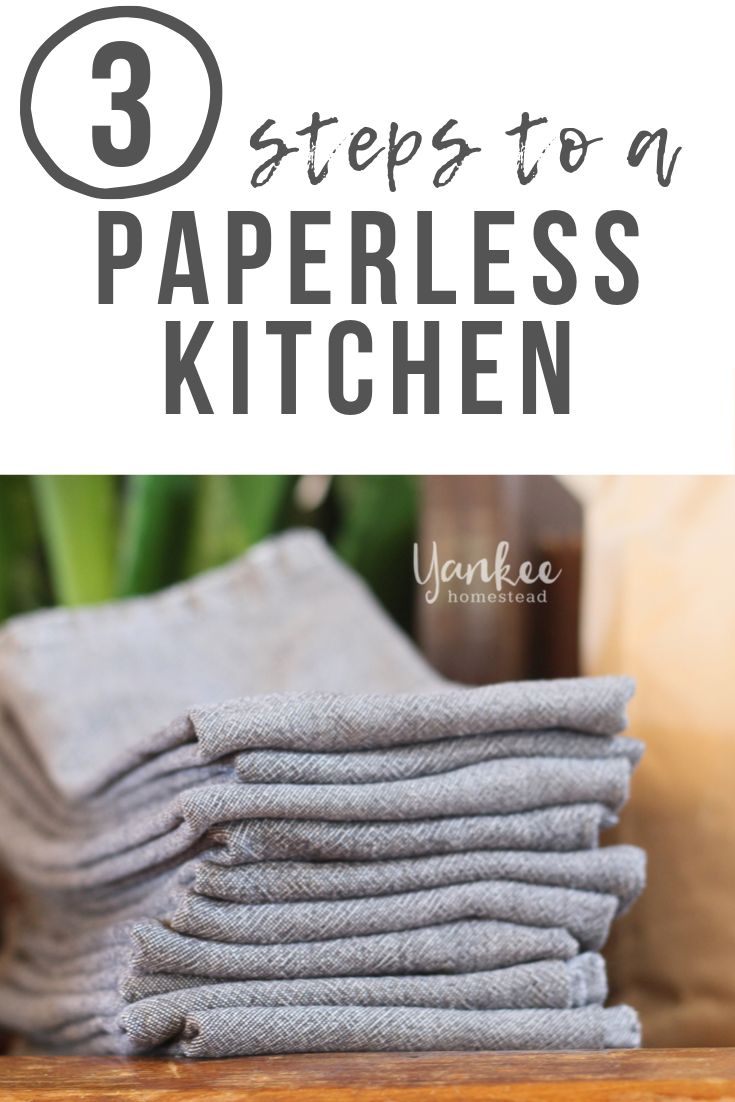 stacks of folded linens on top of a wooden table with text overlay that reads 3 steps to a paperless kitchen