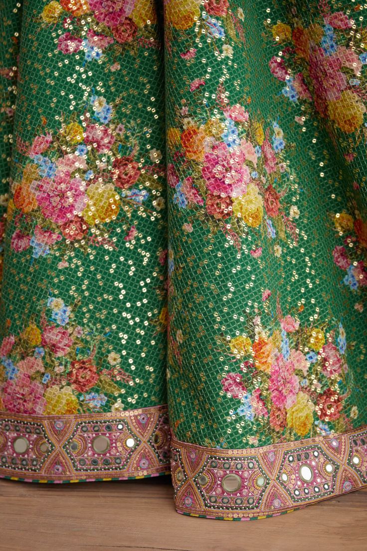 Editor's Note Featuring Panna Aastika Lehenga Set Color: Emerald Green Fabric: Thin Handwoven Chanderi, Pure Cotton Silk, Sequin Fabric Component: Lehenga, blouse and dupatta Occasion: Haldi mehndi and sangeet Care: Dry Clean Only About the Designer Torani by Karan Torani stands handcrafted luxury inspired by the myriad tales of Indian mythology. Torani is a potpourri of all things nostalgic that binds you with a memory long forgotten. The label works with and revives timeless Indian textiles an Emerald Green Fabric, Indian Mythology, Blouse Yoke, Desi Clothes, Lehenga Blouse, Indian Textiles, Wedding Outfits, Sequin Fabric, Digital Gift Card