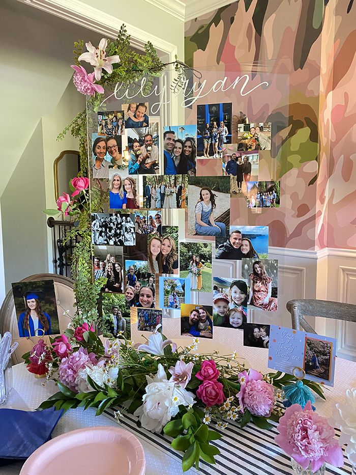 a table with flowers and pictures on it