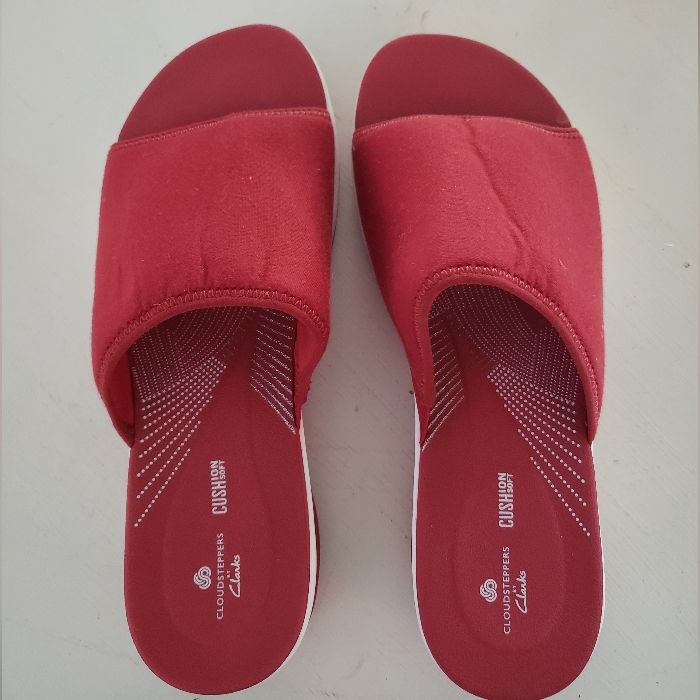 Cloudsteppers By Clarks Slip On Sandals, Red And White, Size 9m, Cushion Soft, 1 3/4" At Heel And Graduates To 1" Thick. Super Comfy ! Never Used Red Synthetic Slippers, Closed Toe Synthetic Slippers With Ortholite Insole, Closed Toe Slippers With Ortholite Insole, Comfortable Red Slides With Round Toe, Comfortable Non-slip Red Sandals, Red Synthetic Slides With Cushioned Footbed, Synthetic Slides With Red Sole, Synthetic Slides With Red Sole And Round Toe, Casual Red Sandals With Textured Footbed