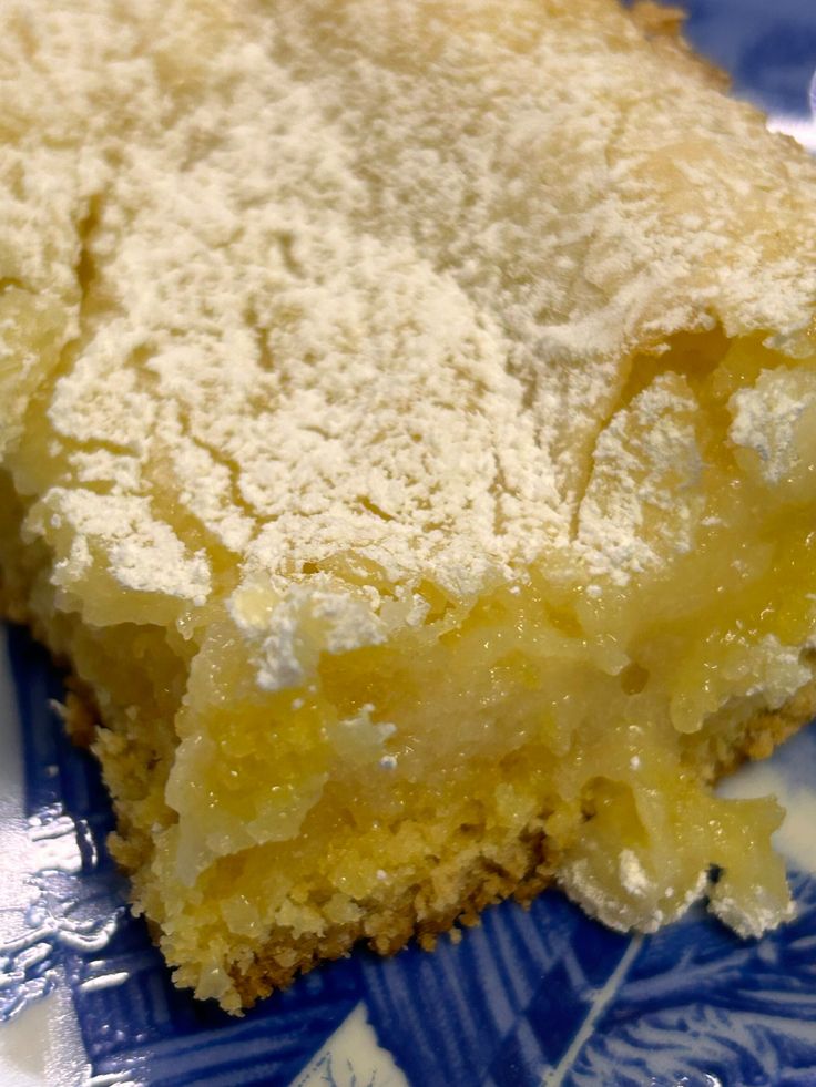 a piece of cake sitting on top of a blue and white plate