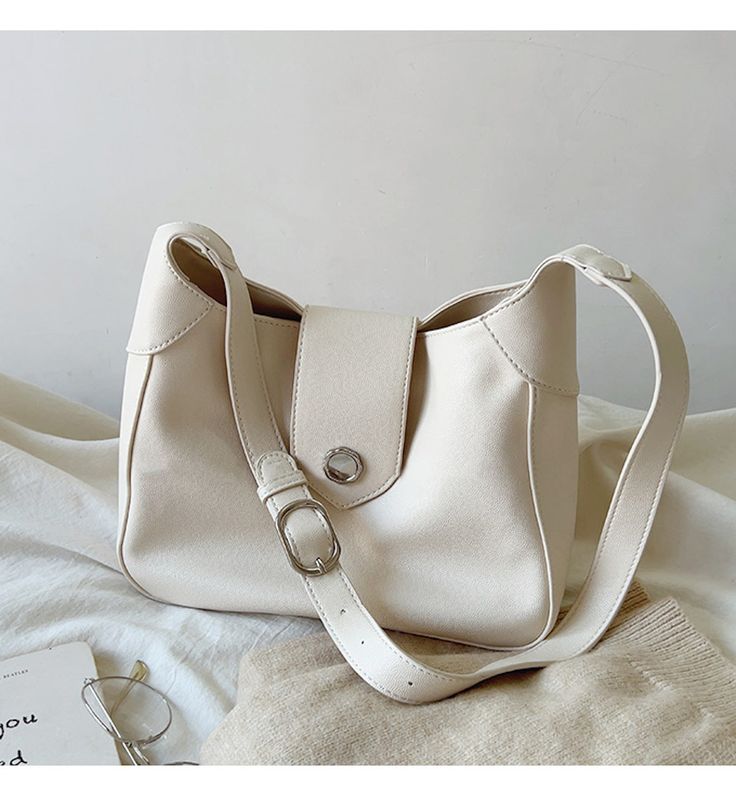 2022 Fall new style. Retro women's leather messenger tote bag. Material: High Quality Soft PU Leather Size: 27cm long x 20cm tall x 9cm wide (11in x 9in x 4in) Designer Style ID: 8398 Retro Leather Shoulder Bag, Women's Everyday Shoulder Bag White Leather Large Capacity Baguette Bag, White Leather Baguette Bag With Large Capacity, Trendy Faux Leather Satchel With Single Shoulder Strap, Trendy Faux Leather Shoulder Bag With Hasp Closure, Shopping Bucket Shoulder Bag With Hasp Closure, White Leather Bag With Hasp Closure, Rectangular Faux Leather Satchel With Single Strap, Daily Use Shoulder Bag With Hasp Closure, Daily Use Bucket Bag With Hasp Closure