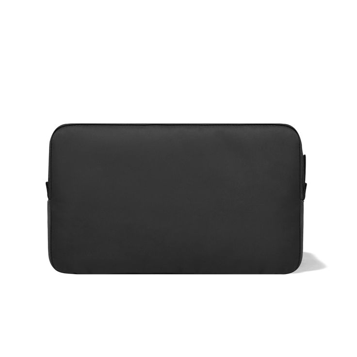 Crafted out of resilient, water-repellent, recycled nylon, the spacious Toiletry Pouch is perfect for both travel and daily use. It's roomy interior and functional pockets make this the ideal bag for storing and carrying all your essential toiletries and cosmetics. Versatile Black Cosmetic Bag For Travel, Functional Travel Bag With Zipper Pouch, Functional Travel Pouch With Luggage Sleeve, Functional Travel Pouch With Rectangular Shape, Functional Travel Pouch Rectangular Case, Functional Rectangular Travel Pouch, Modern Black Rectangular Pouch, Functional Travel Pouch Case, Functional On-the-go Pouch With Luggage Sleeve