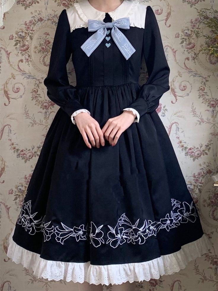 Features: It features a peter pan collar with ruffle-trimmed, long bishop sleeves, heart-shaped embroidery front, elegant dress.  Attention: This price includes the OP only, white apron and others are not included.  Size Chart of OP:   	 		 			Size(cm) 			S 			M 			L 			XL 			XXL 		 		 			Bust 			78-84 			84-88 			88-92 			92-96 			96-100 		 		 			Waist 			58-64 			64-68 			68-72 			72-76 			76-80 		 		 			Dress length 			110 			112 			114 			116 			118 		 		 			Sleeve length 			58 			59 			60 Elegant Long Sleeve Costume Dress, Black Long Sleeve Vintage Costume Dress, Black Long Sleeve Vintage Dress For Costume, Spring Vintage Dress For Costume, Classic Long Sleeve Costume Dress, Spring Costume Vintage Dress With Long Sleeves, Black Peter Pan Collar Dress For Fall, Spring Vintage Long Sleeve Costume Dress, Spring Vintage Long Sleeve Dress For Costume