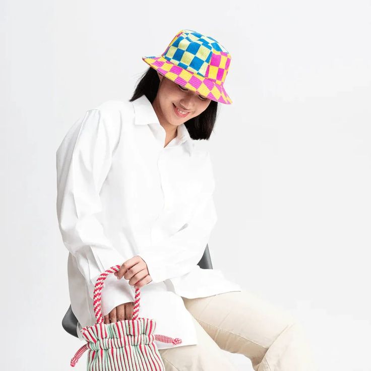 Our Checkerboard Patchwork Bucket Hat for women. The perfect fun and colorful bucket hat for summer. knit hat for summer, crochet hat for summer, bucket hat outfit for summer. Multicolor Curved Brim Bucket Hat For Spring, Casual Spring Bucket Hat For Picnics, Spring Multicolor Curved Brim Bucket Hat, Spring Multicolor Bucket Hat With Short Brim, Trendy Multicolor Bucket Hat With Short Brim, Multicolor Short Brim Bucket Hat For Spring, Spring Plaid Hat With Curved Brim, Spring Multicolor Short Brim Bucket Hat, Multicolor Bucket Hat For The Beach