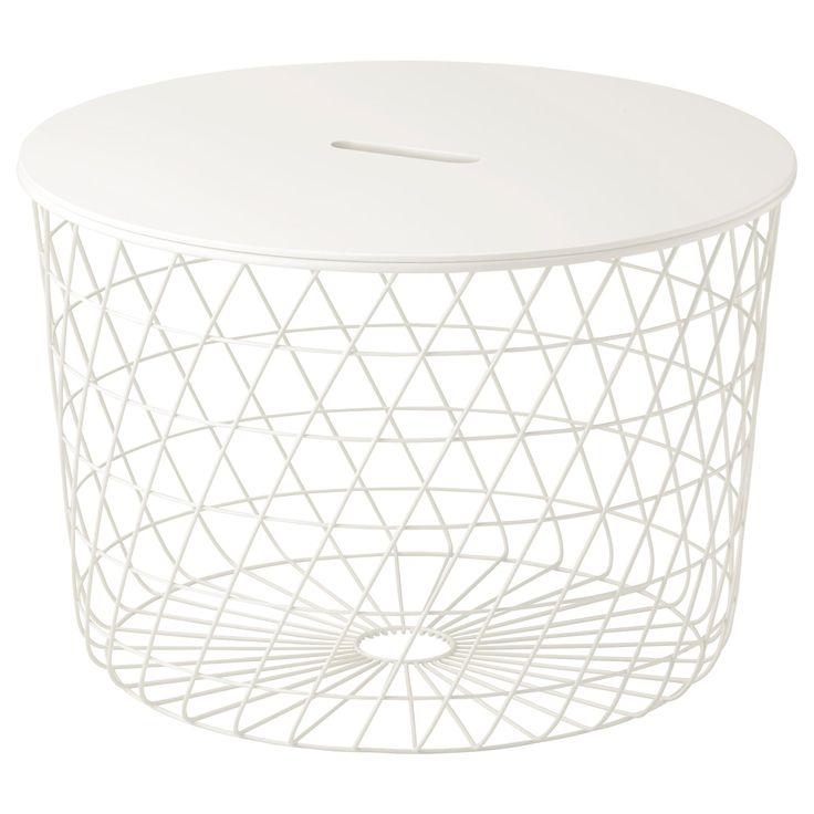 a white wire table with a circular top