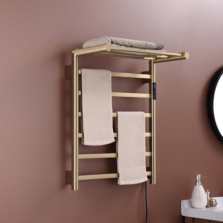 a bathroom with a towel rack and mirror