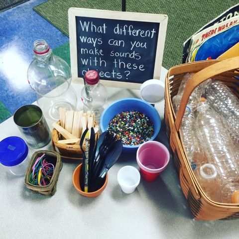 an assortment of craft supplies sitting on a table with a sign in the background that says what different ways can you make sounds with these objects?