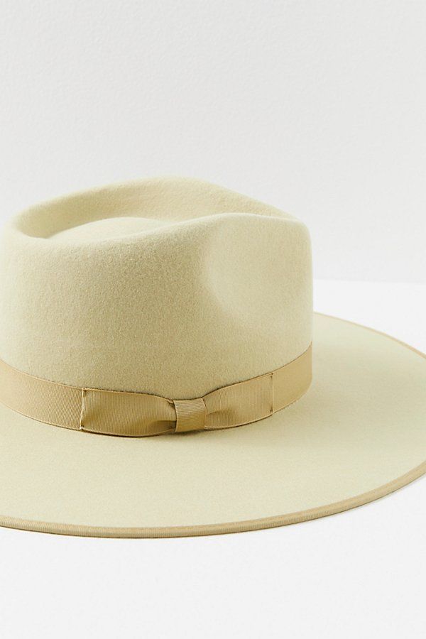 Top things off with this structured Australian wool hat featured in a round brim design with a ribbon on the crown. **Features:** Australian wool fabrication, round brim style, dipped crown, ribbon band, interior band for secure fit **Why We | Rancher Felt Hat by Lack of Color at Free People in Green, Size: M Spring Brimmed Fur Felt Fedora, Wool Fedora With Brim For Spring, Chic Wool Fedora Felt Hat, Spring Wool Fedora Felt Hat, Spring Wool Fedora Hat, Chic Wool Fedora Hat, Spring Adjustable Wool Felt Hat, Elegant Beige Felt Hat With Flat Crown, Elegant Beige Flat Crown Felt Hat