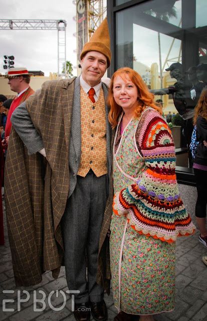 a man and woman dressed up in costumes