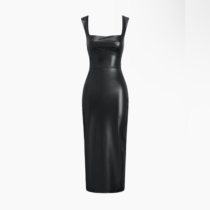 a black leather dress with straps on the back and side, in front of a white background