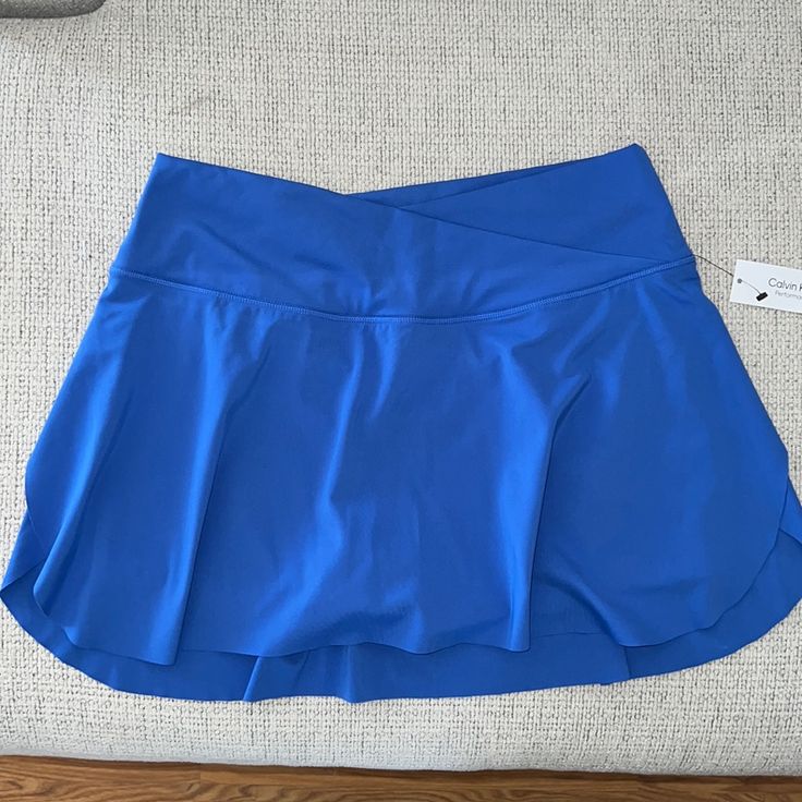 Blue Tennis Skirt Calvin Klein Nwt Great Quality Perfect For Sports Built In Pocket In The Shorts Blue High Waist Skort With Pockets, High Waist Blue Skort With Pockets, Blue High-waist Skort With Pockets, Blue Mini Skort With Pockets, Stretch Blue Tennis Skirt With Pockets, Blue Stretch Tennis Skirt With Pockets, Sporty Blue Tennis Skirt With Elastic Waistband, Sporty Short Blue Skirt, Blue High Waist Swim Skirt For Spring