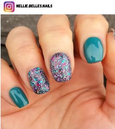 49+ Teal Nail Ideas and Designs for 2024 - Nerd About Town Teal Nails With Glitter, Teal Nail Ideas, Teal Nails Sparkle, Teal Sparkle Nails, Pink And Teal Glitter Nails, Teal Nails With Glitter Accent, Nails Teal, Teal Acrylic Nails, Pointing Fingers