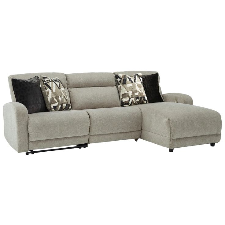 a sectional sofa with pillows on the back and two recliners at the end