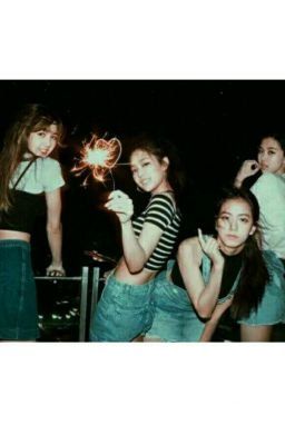 the girls are posing with their sparklers in front of them and one girl is holding her hand up