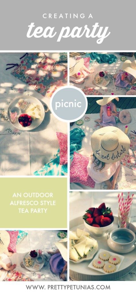 an outdoor tea party with strawberries and cupcakes