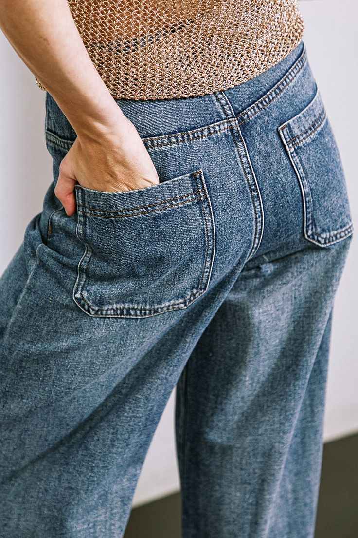 Indulge in the luxurious feel of these washed denim pants, complete with a front closure, side/back pockets, a contrasting tie, and a wide leg design.Details:Self : 100% CottonSize & Fit- Model is 5`8" And Wearing Size Small- Measurements Taken From Size Small- Approx. Length: 43" Wide-leg Denim Jeans With Patch Pockets, Wide Leg Washed Blue Flare Jeans With Belt Loops, Fall Wide Leg Flare Jeans With Side Pockets, Wide-leg Denim Jeans With Belt Loops, Wide Leg Cropped Jeans With Pockets, Washed Blue Wide Leg Jeans With Patch Pockets, Denim Blue Wide-leg Flare Jeans With Pockets, Medium Wash Wide Leg Cropped Jeans With Patch Pockets, Dark Wash High Rise Wide Leg Pants With Pockets