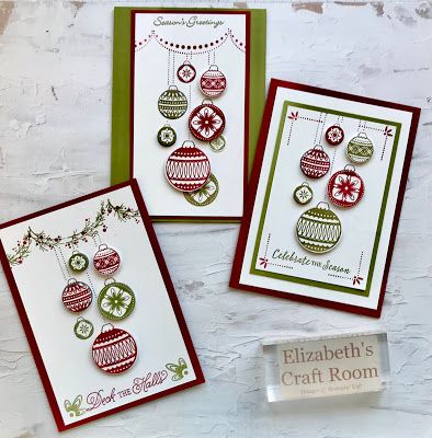 three christmas cards with ornaments on them, one is green and the other is red