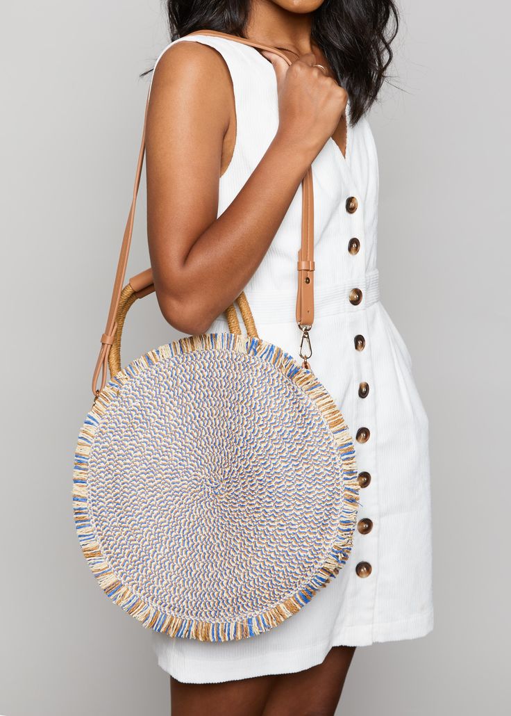 The Season in the Sun Bag is a woven, circular tote that is sure to add some flare to your favorite outfit! Blue like the sea & light as the summer breeze, this tote will keep you getaway-ready all season long! Chic Woven Beach Bag With Round Handle, Summer Straw Bag With Woven Leather And Round Handle, Chic Spring Beach Bag With Round Handle, Summer Woven Leather Bag With Round Handle, Straw Bag With Round Handle For Beach, Vacation Shoulder Bag With Woven Leather And Round Handle, Spring Travel Straw Bag With Round Handle, Trendy Straw Bag With Round Handle For Beach, Spring Beach Bag With Round Handle