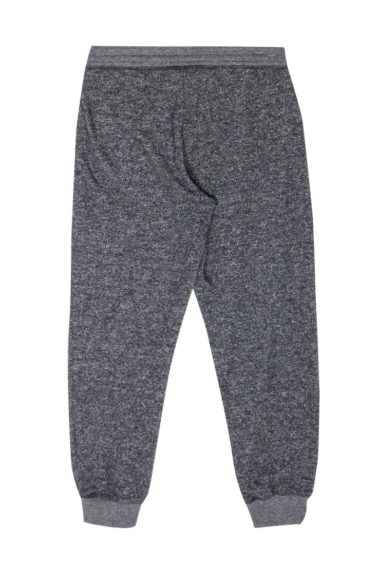 Go sleek in streetwear with these luxe sweatpants from Theory! These classic lounging staples are upgraded with a trendy jogger silhouette and neutral heathered grey hue. Perfect for all the cool and casual babes out there! Go super sporty chic for grabbing coffee or running errands downtown (or even just chilling at home!) when you pair these beauties with a soft sweatshirt and your favorite chunky sneakers. Size P 90% Polyester, 10% Cotton Pull-on Drawstring waistband Jogger-style silhouette O Gray Sweatpants For Fall Loungewear, Heather Grey Relaxed Fit Sweatpants For Loungewear, Sporty Gray Joggers For Lounging, Gray Leisure Bottoms With Ribbed Cuffs, Gray Winter Sweatpants For Loungewear, Gray Sweatpants For Winter Loungewear, Gray Sweatpants With Ribbed Waistband For Lounging, Gray Loungewear Bottoms With Ribbed Cuffs, Casual Heather Grey Sweats For Loungewear