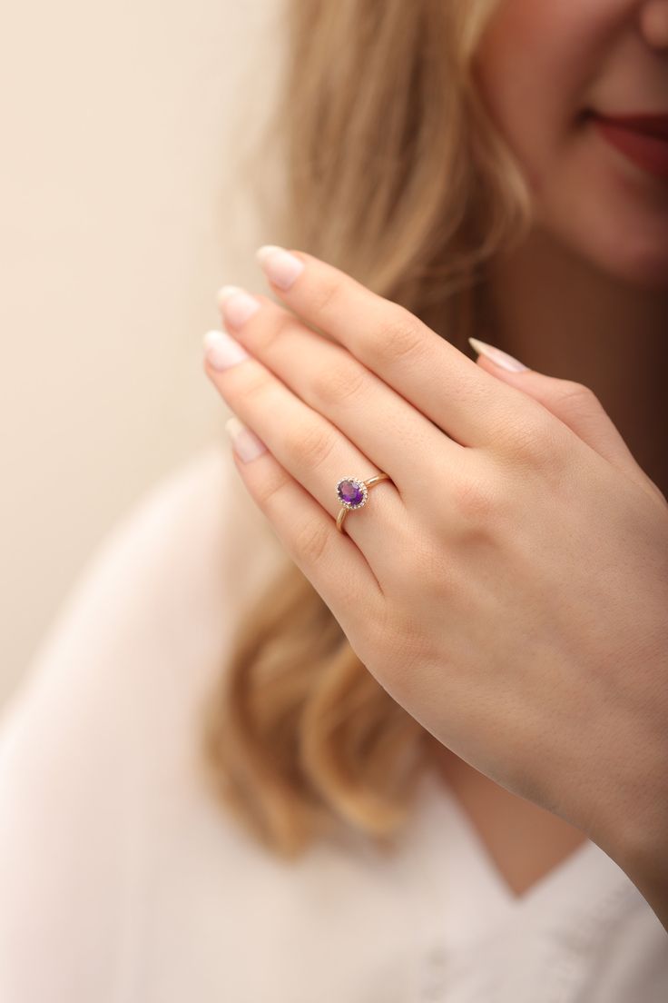 "14k & 18k Genuine Amethyst With Diamond Ring / February Birthstone / Gold Purple Amethyst Ring Available in Gold, Rose Gold and White Gold ❥ ITEM DETAILS ---> Gold Color of Choice : Yellow Gold, Rose Gold, White Gold ---> Material : 14k ( 585 ) or 18k ( 750 ) Real Gold. It is Not Gold Filled or Gold Plated ---> Made to order ---> Band Thickness : 1.40 mm ---> Band Width : 1.70 mm ---> Amethyst Cut: Oval Cut ---> Size of Amethyst: 7x5 mm ---> Clarity : H color VS/SI - Yellow Gold Amethyst Ring With Accent Stones, Round Cut, Yellow Gold Amethyst Ring With Round Cut Accent Stones, 14k Gold Purple Sapphire Ring With Accent Stones, Amethyst Center Stone Birthstone Ring In Yellow Gold, Yellow Gold Birthstone Ring With Amethyst Center Stone, Heirloom 14k Gold Amethyst Ring With Accent Stones, 14k Gold Amethyst Ring With Purple Gemstone, 14k Gold Purple Amethyst Ring, Yellow Gold Amethyst Ring With Round Cut