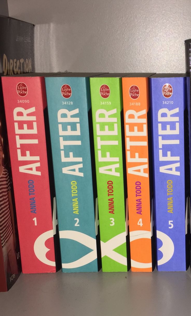 several books are lined up on a shelf in front of a book case that says after after