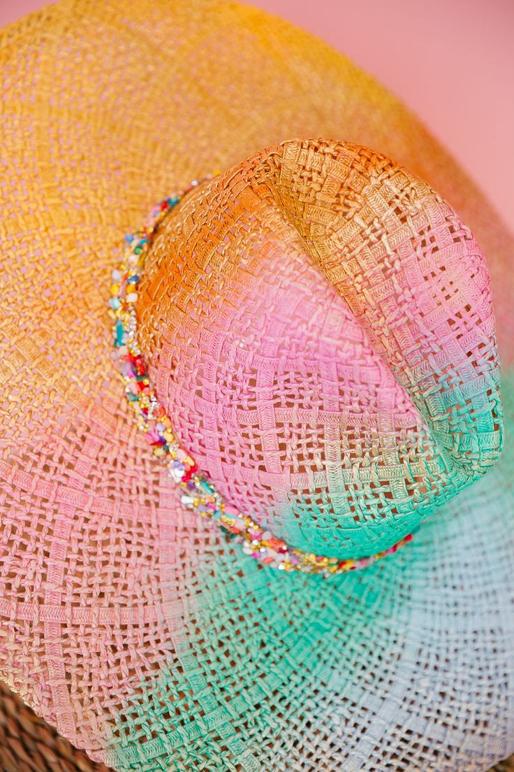 Embrace the rainbow with THE IBIZA SUN HAT! This colorful sun hat features a stoned band for a touch of sparkle and is sure to make you stand out. Its unique design adds a fun and playful touch to any outfit. Protect yourself from the sun in style (and with a little extra flair). This hat is ONE OF A KIND, created by our owner Stephanie. To receive item quicker, expedited shipping is available at checkout. Adjustable Hat With Round Crown For Summer, Multicolor Beaded Party Hats, Trendy Multicolor Adjustable Straw Hat, Colorful Adjustable Sun Hat For Beach, Colorful Adjustable Sun Hat For The Beach, Adjustable Colorful Sun Hat For Beach, Multicolor Hat Bands For Beach In Spring, Adjustable Multicolor Sun Hat, Whimsical Adjustable Multicolor Sun Hat