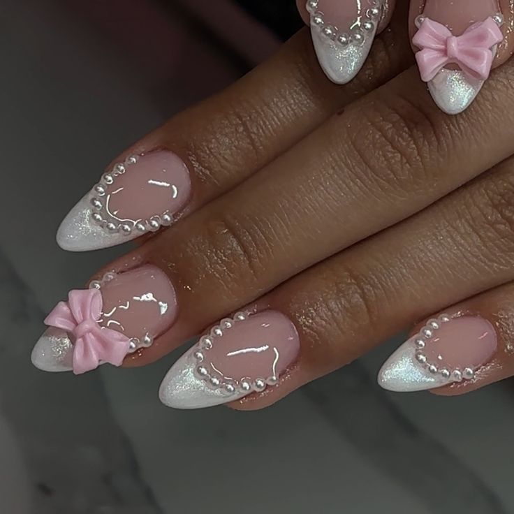 Coquette 🎀 🤍 . . . . . . . . . . . . . #coquette #coquettenails #acrylic #acrylicnails #acrylicnaildesign #nails #nailday #nailsofinstagram #nailart #trendynails #lasvegasnailtech #lasvegasnails Cute Vintage Nails, Friendsgiving Nails, Marie Antoinette Inspired Nails, Almond Nails With Bow Charm, Black And White Coquette Nails, Bow Almond Nails, Coquette Almond Nails, Simple Coquette Nails, Couqutte Nails