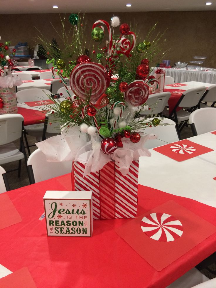 a candy cane centerpiece on top of a table