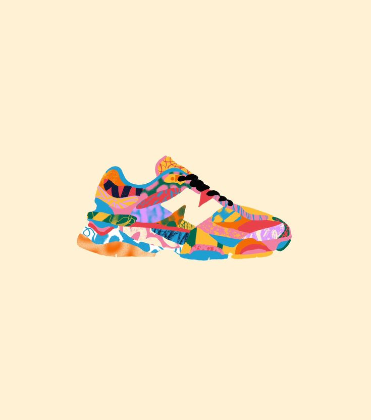 a pair of sneakers with colorful paint splattered on them