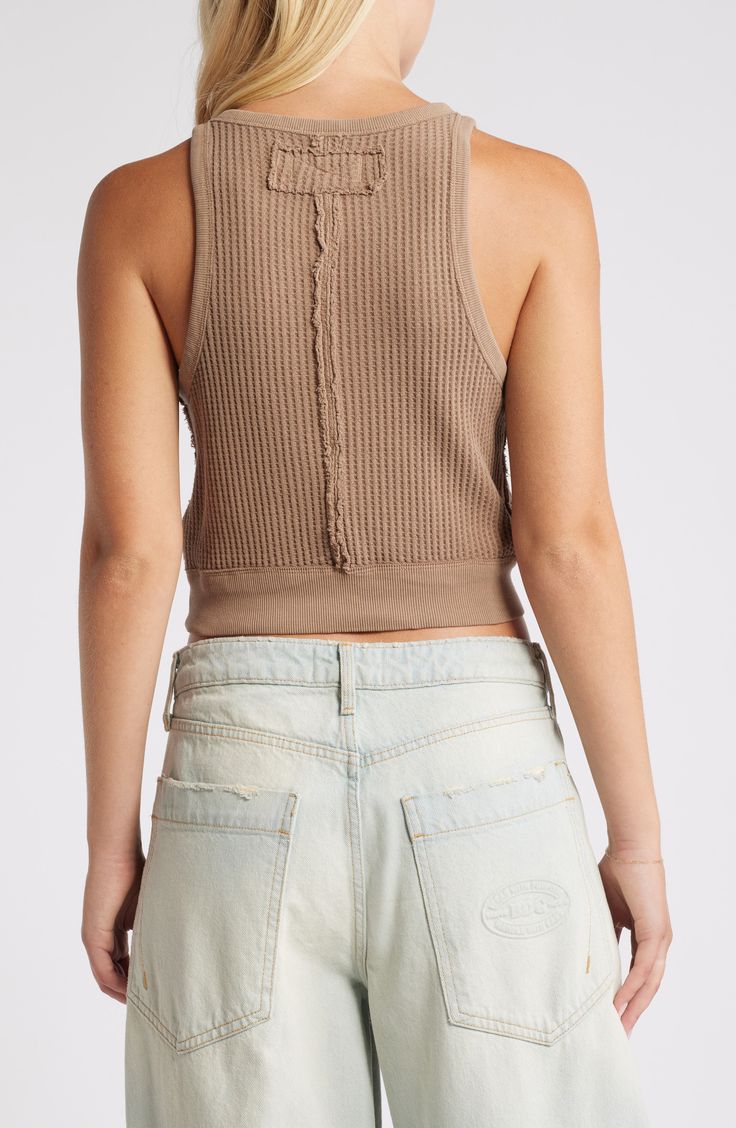 Soak in the sunshine with this waffle-stitch tank cut in a cropped length that's a great complement to high-rise styles. 19" length (size Small) Crewneck 100% cotton with 96% cotton, 4% elastane contrast Machine wash, dry flat Imported Spring Cotton Ribbed Crop Top, Ribbed Cotton Crop Top For Spring, Spring Ribbed Cotton Crop Top, Spring Cotton Cropped Hem Tank Top, Everyday Spring Tank Crop Top, Spring Casual Cropped Hem Tank Top, Cotton Waffle Knit Tops For Summer, Summer Cropped Ribbed Tank Top, Ribbed Cropped Tank Top For Summer