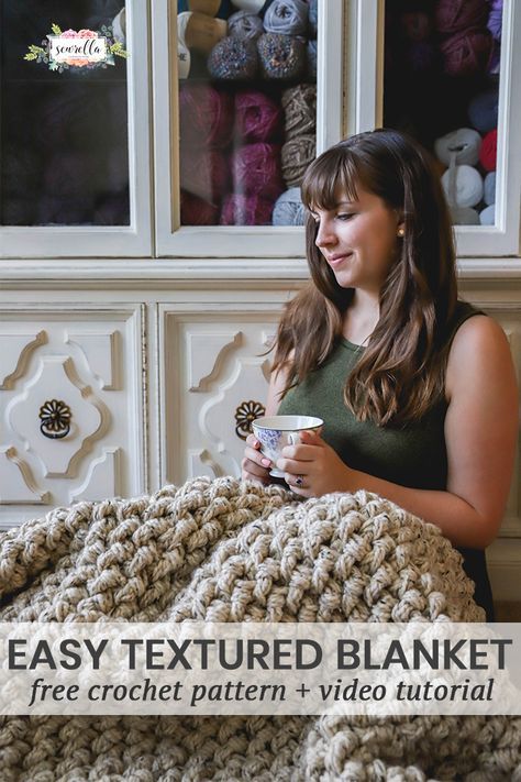 a woman is holding a cup in front of a crocheted blanket with text that reads easy textured blanket free crochet pattern video tutor