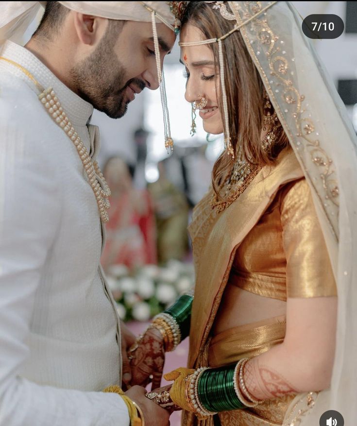 a man and woman standing next to each other