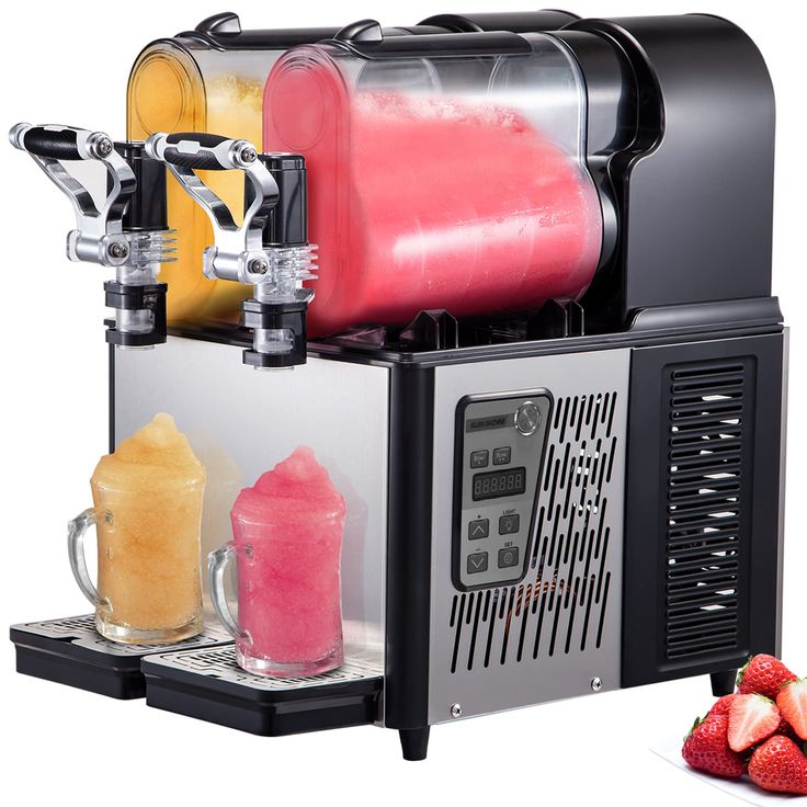 a machine that is filled with different types of juices and smoothies next to some strawberries