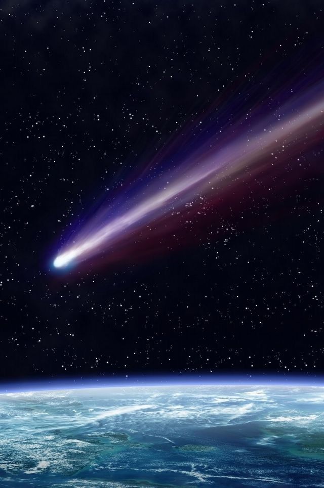 an artist's impression of a comet shooting towards earth