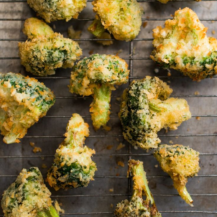 broccoli florets on a cooling rack ready to be cooked in the oven