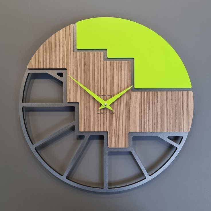 a clock made out of wood and metal with green numbers on the face is shown